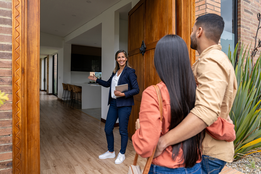 Real estate agent showing house interior